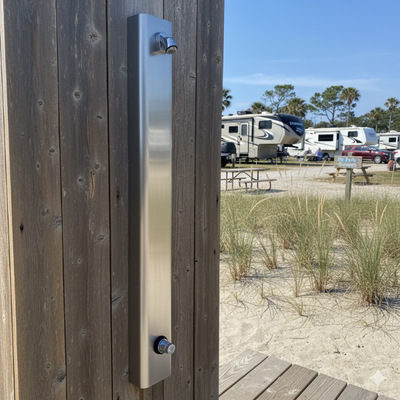 Metered shower panel for water conservation at an rv beach campground