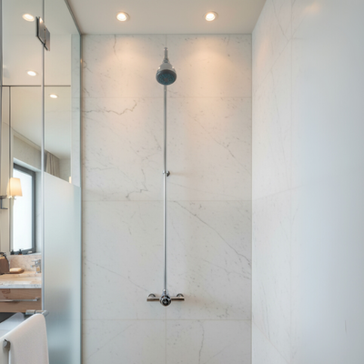 indoor shower tower kit - push button, adjustable time & temp at a resort / hotel main