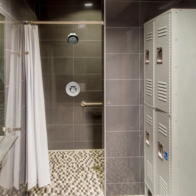 time and temperature adjustable shower valve and anti-ligature shower head at a high school gym
